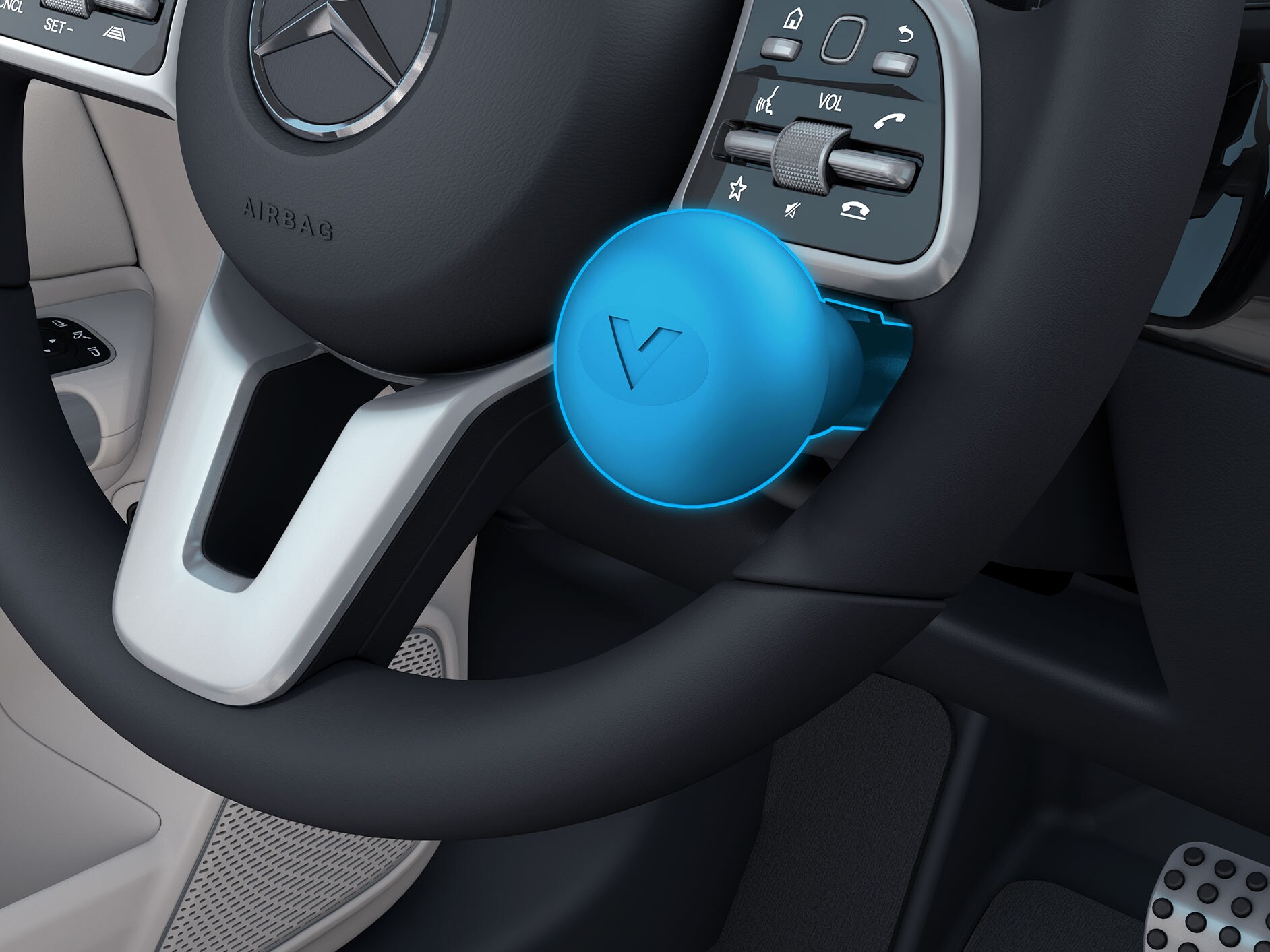 O imagine detaliată a mânerului volanului tip nucă dreapta în combinație cu un autovehicul adaptat persoanelor cu dizabilități.