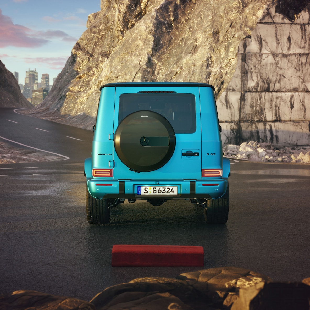 Perspectivă frontal-laterală a modelului Mercedes-AMG G 63 cu pachetul AMG din fibră de carbon pentru exterior.
