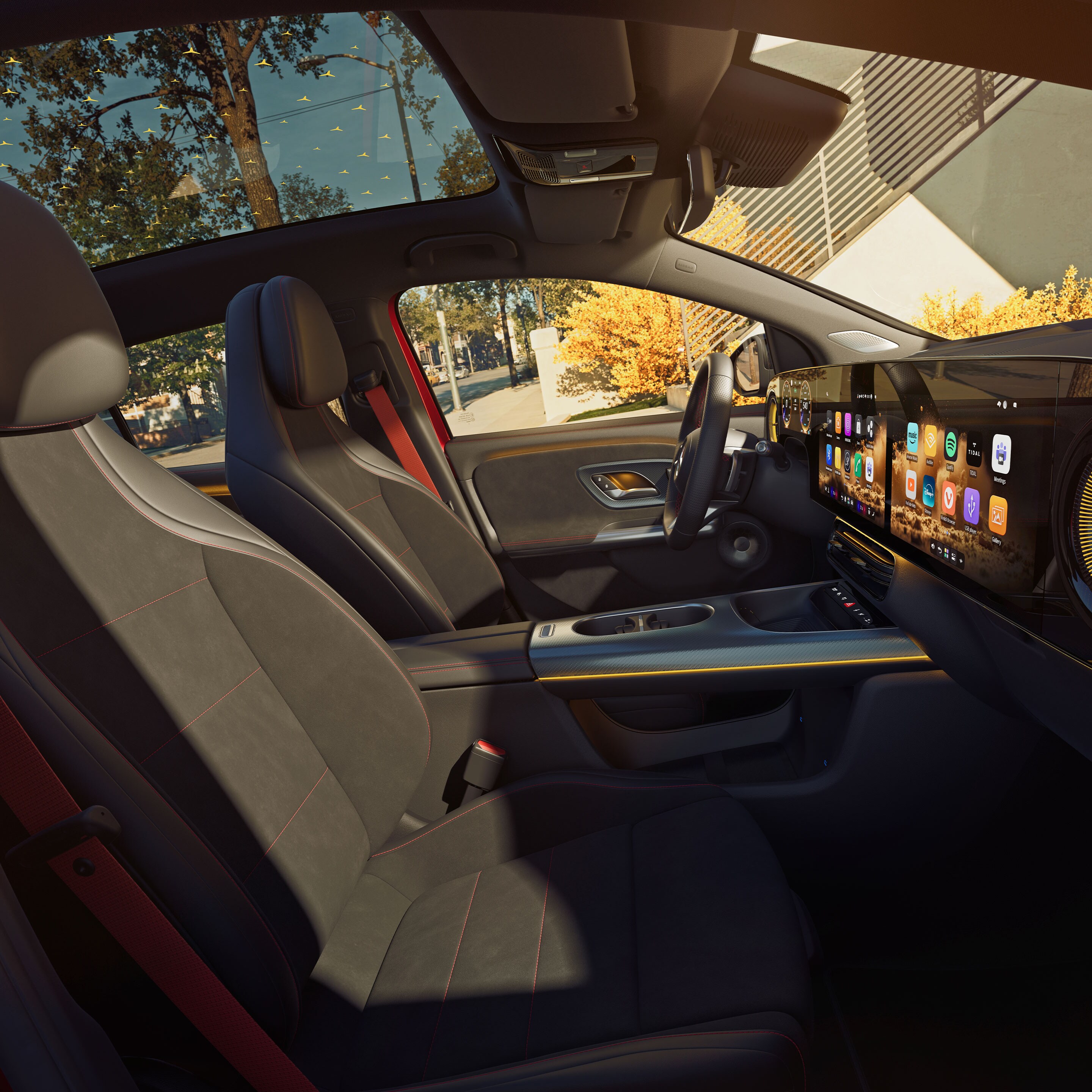Interiorul noului GLA electric de la Mercedes-Benz, în prim plan cu rândurile de scaune din față și din spate, văzute prin geamul pasagerului din față.