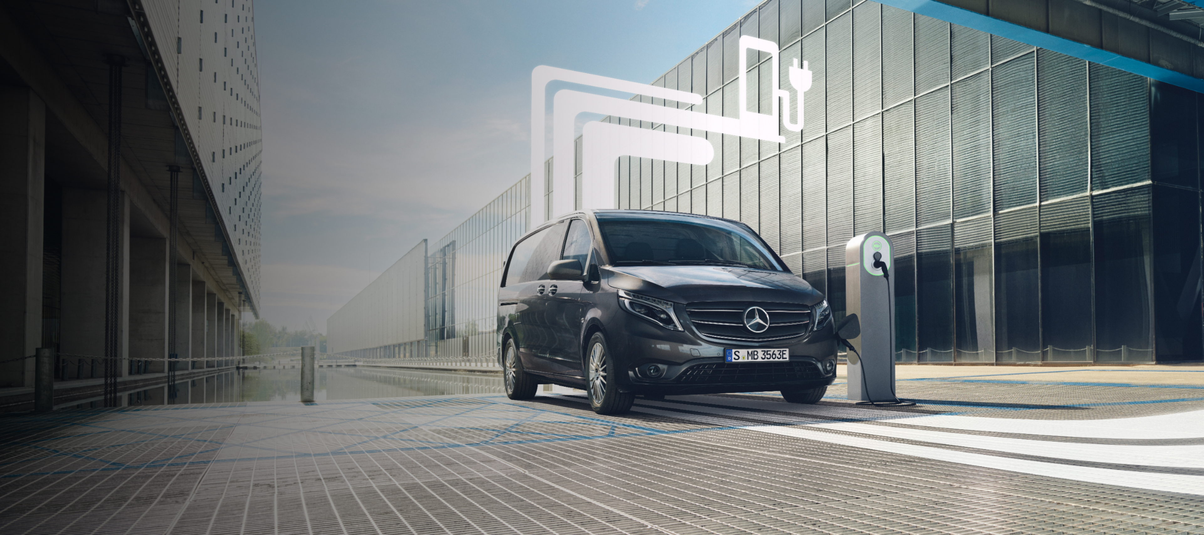 Mobilitate electrică | Extraopțiuni digitale | Mercedes-Benz Autovehicul comercial cu elemente grafice, reprezentând extraopțiunile digitale.