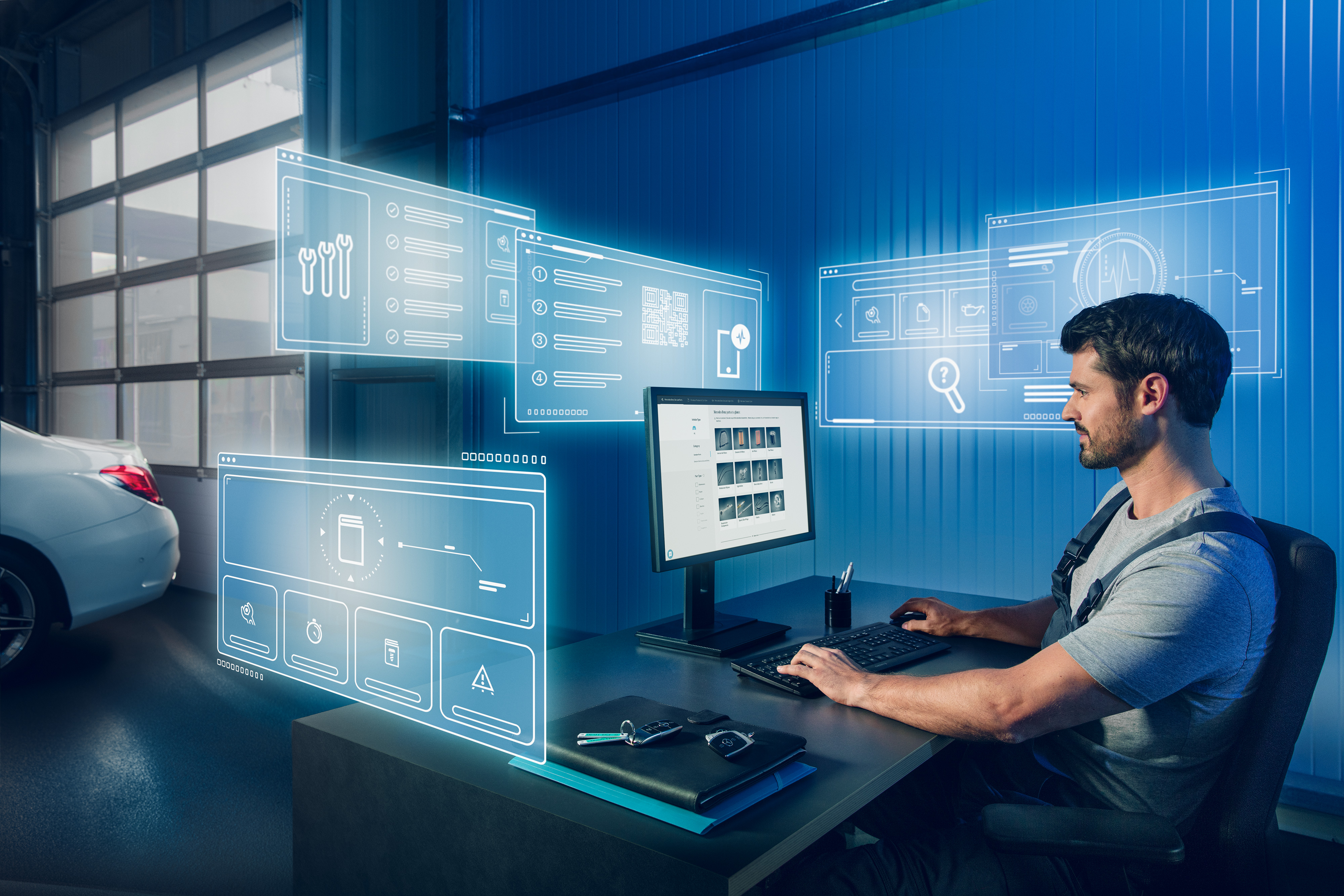 Mercedes-Benz | Piese de origine de calitate pentru autovehicule comerciale Mecanic care caută piese de origine Mercedes-Benz potrivite în catalogul de piese de schimb Mercedes pe computer.